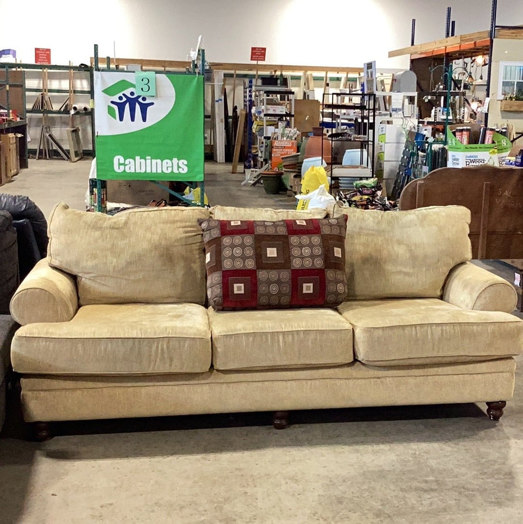 Comfy gold couch. - Kenner Habitat for Humanity ReStore
