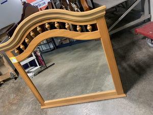 Light brown curved mirror - Kenner Habitat for Humanity ReStore